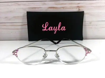 Rimless reading glasses embellished with pink crystals