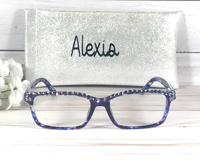 Genuine Purple Swarovski Crystals embellish this reader. Personalize the case with Name. +1.25
