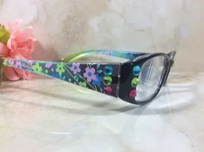 PETITE READER with a Flowery Design on the arms. AB Crystals added to the frame. Free Personalized Case with your Name.
