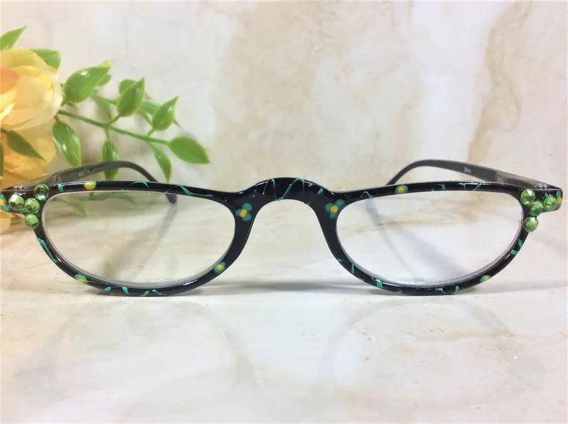 HALF MOON READERS with Lime Green Crystals to elevate a beautiful look. Free Vinyl case with purchase. +1.75