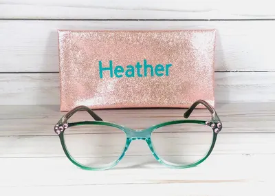 Genuine Pink Swarovski Crystals adorn this very popular reader. Personalized Glitter Cases, too. +1.25.